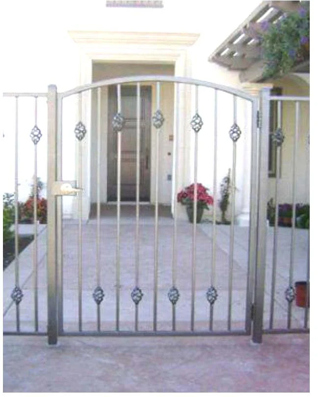 Bronze arched pedestrian gate with decorative castings, fabricated from modern steel